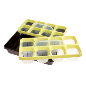 Green seed starter trays with white inserts